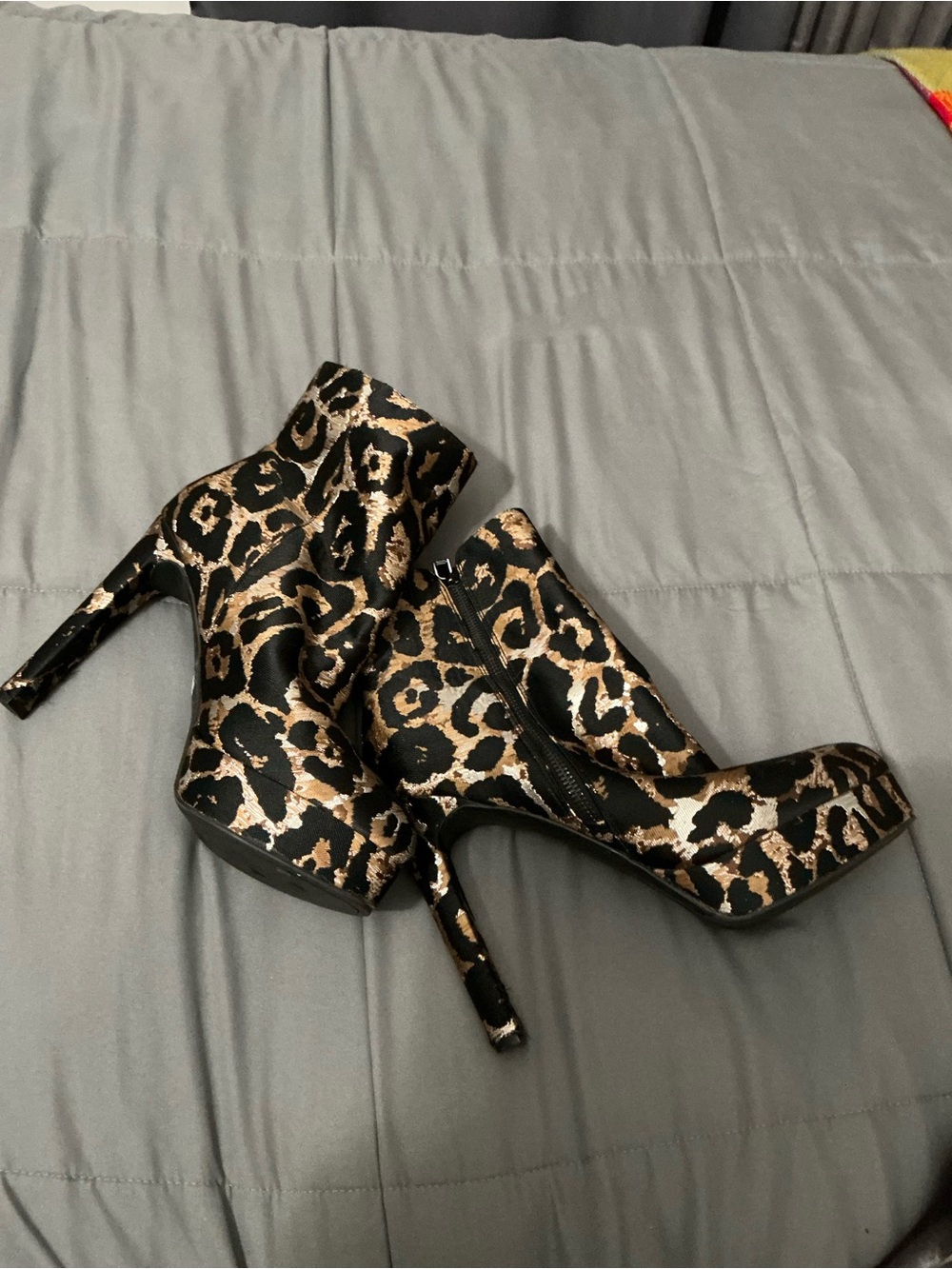 Guess Leopard-Print Stiletto Ankle Boots in Black and Gold